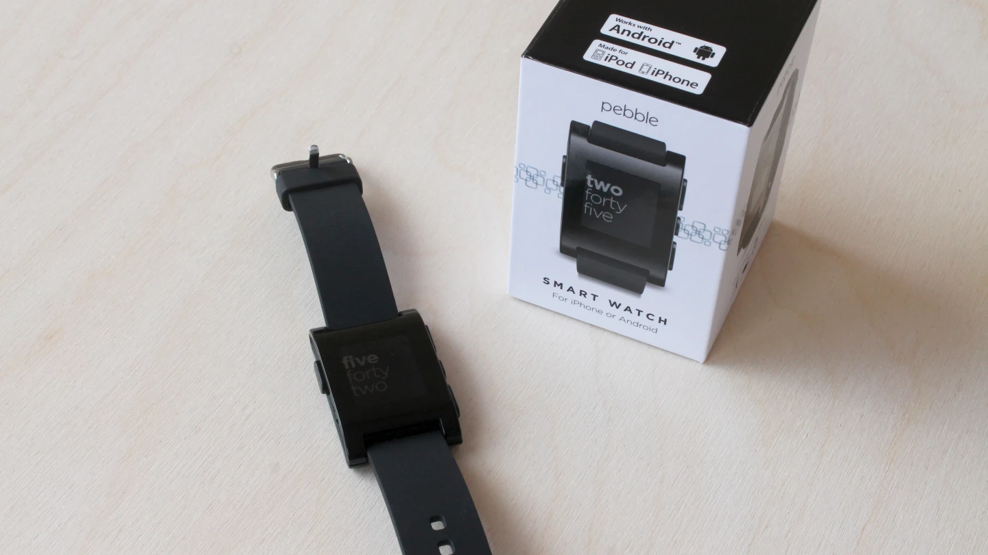 Pebble next to its retail packaging