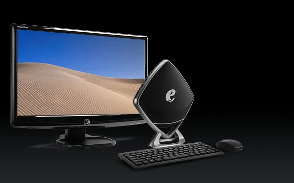 The glossy black diamond shape of the Mini-e from eMachines could well see it take front stage on a user's desk instead of being hidden behind monitors like others of its kind