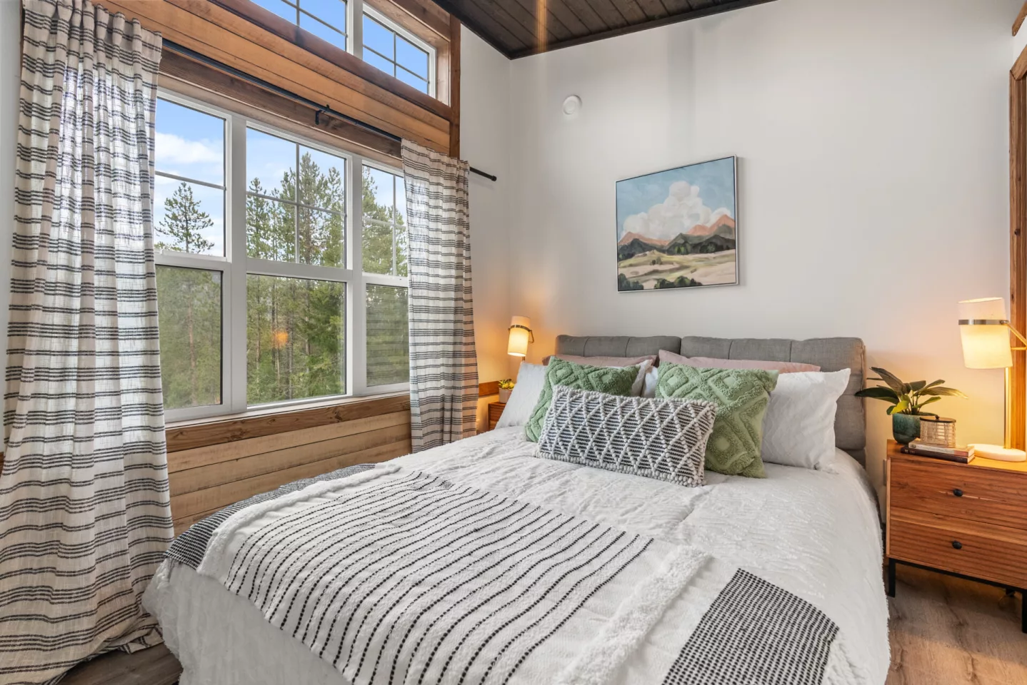 The Silvertip's master bedroom is downstairs and includes a queen-sized bed, with ample headroom to stand upright