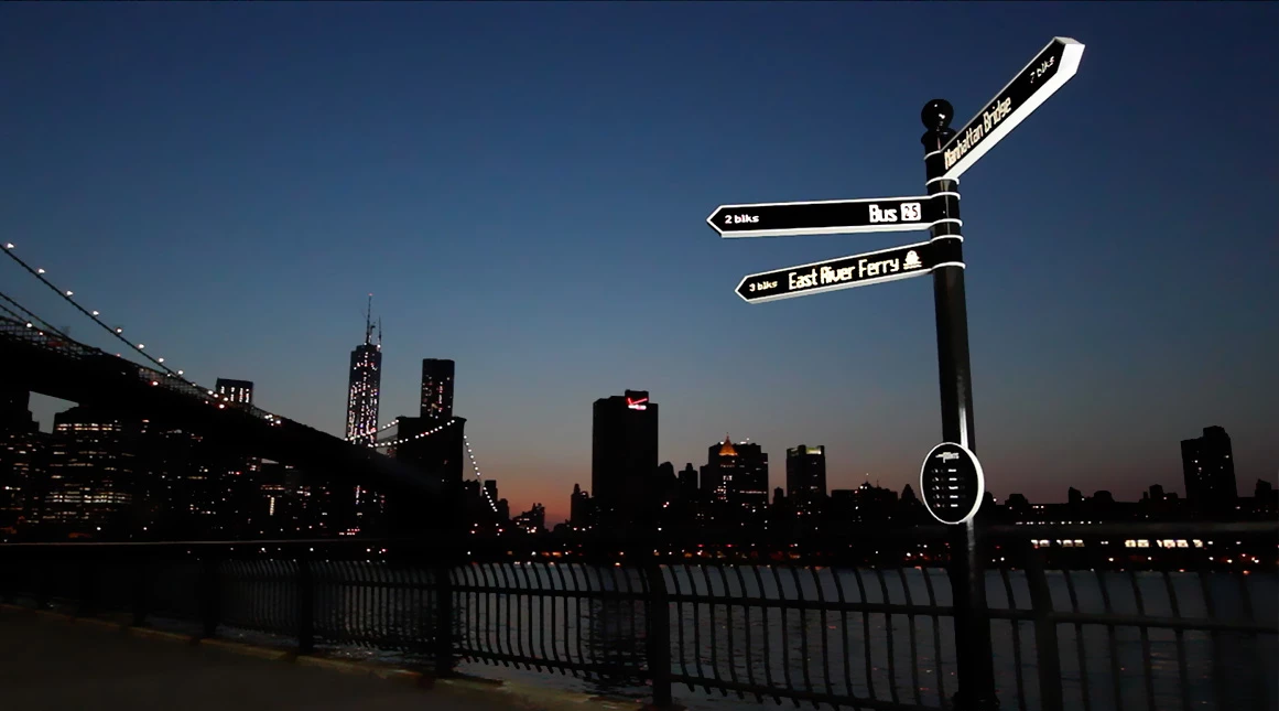 Points is an internet-connected street sign that pulls data from social media and spins 360 degrees to aim in the direction of any location or event