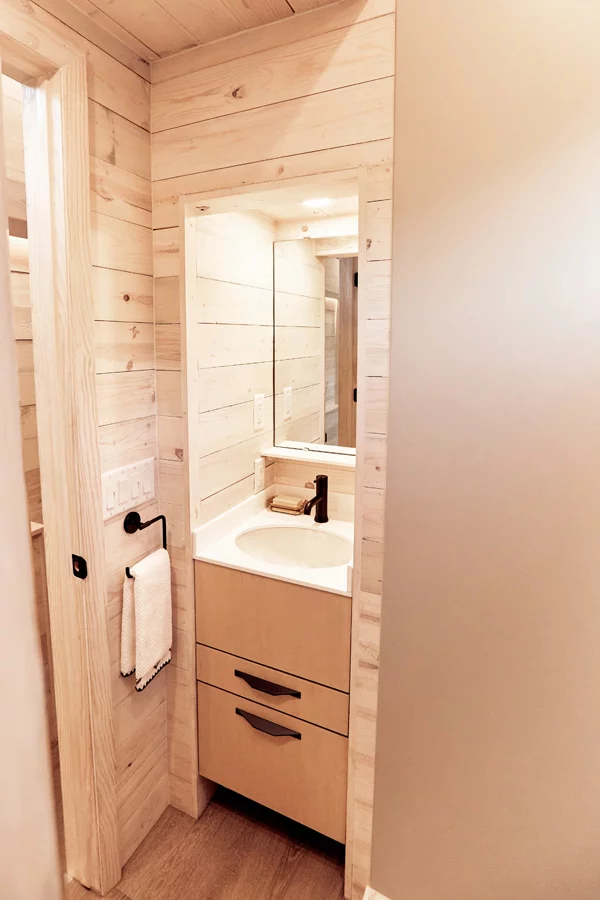 The Draper's bathroom includes a shower, sink, and toilet