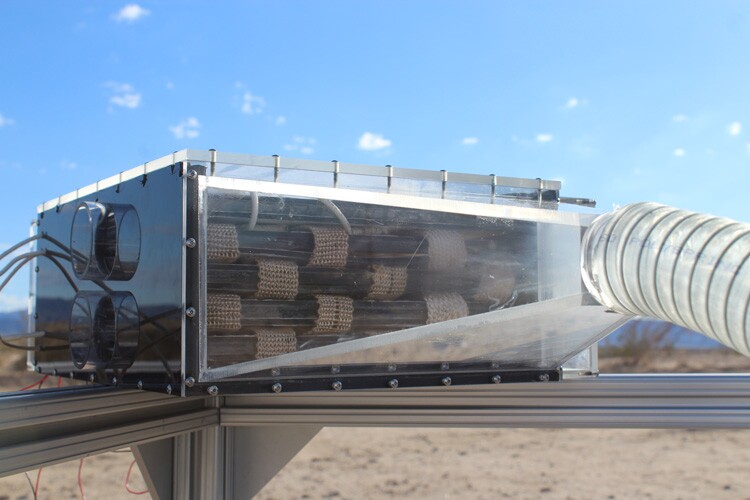 The water harvester is made up of a fan that blows air over cartridges of metal-organic frameworks inside a box, which collect water and release it into a condenser.