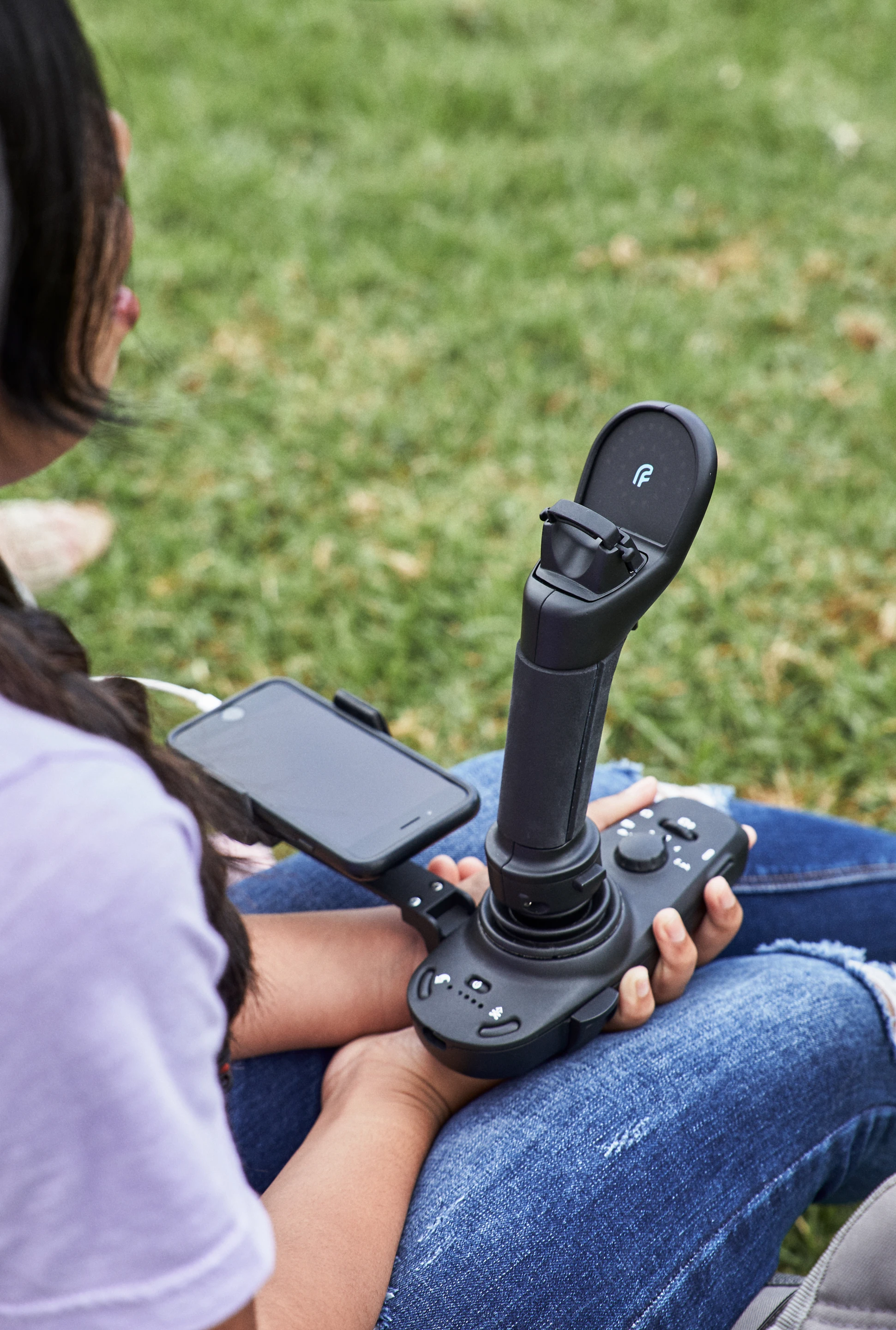 The FT Aviator is made up of a 7-in joystick on a base with a phone holder jutting out the side