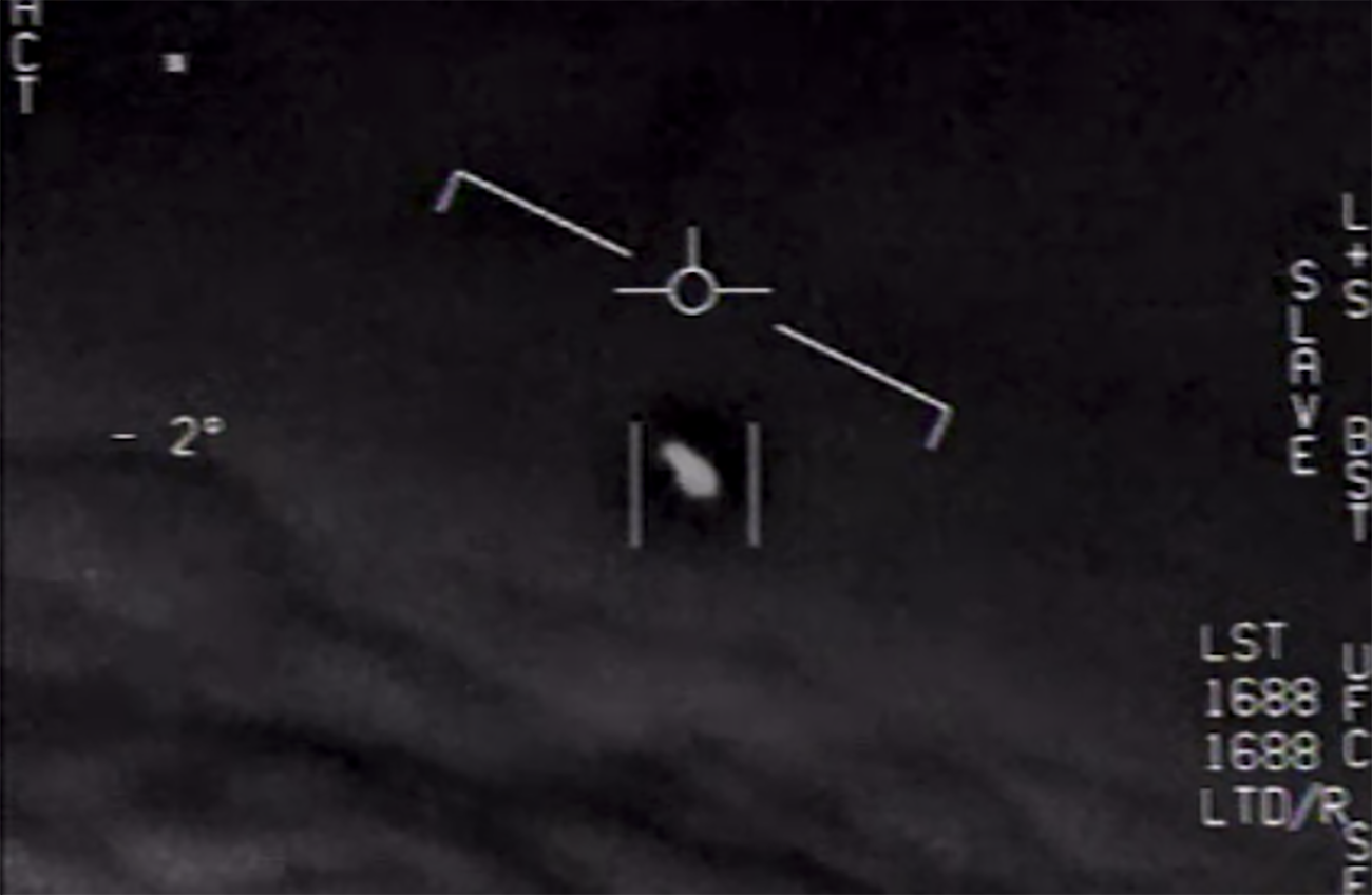 A still of an unidentified aerial phenomenon (UAP) from a video recorded by US Navy fighter jets in 2015