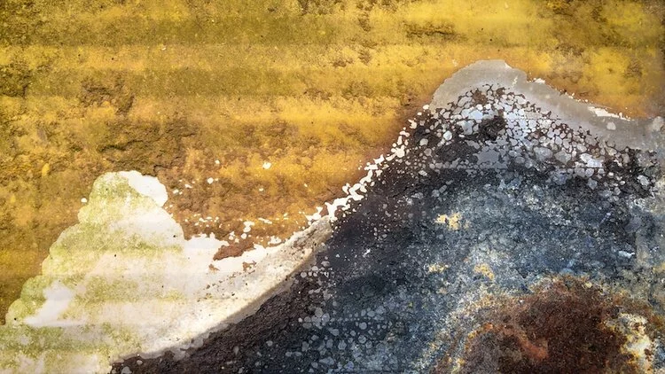 Towards the Mountain by Melanie Collie was the second place winner in the Manmade World category of the 2020 Close-up Photographer of the Year. A rusted piece of metal begins to resemble a mountain and a cloud.