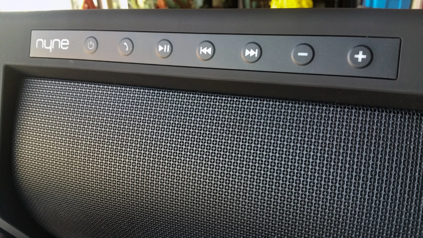 The Nyne Rock's controls are neatly arrayed across the top, glowing white while the speaker is on