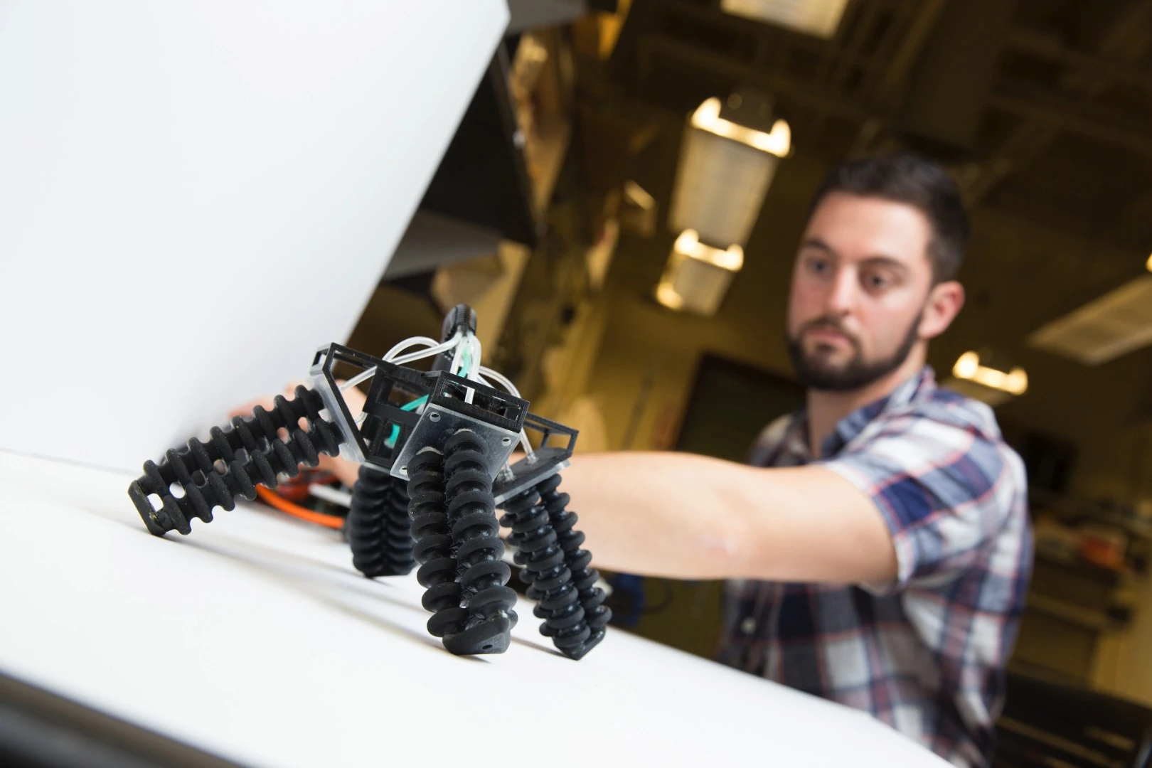 Right now the bot is attached to tubes and a circuit board, but the researchers are working on making it autonomous