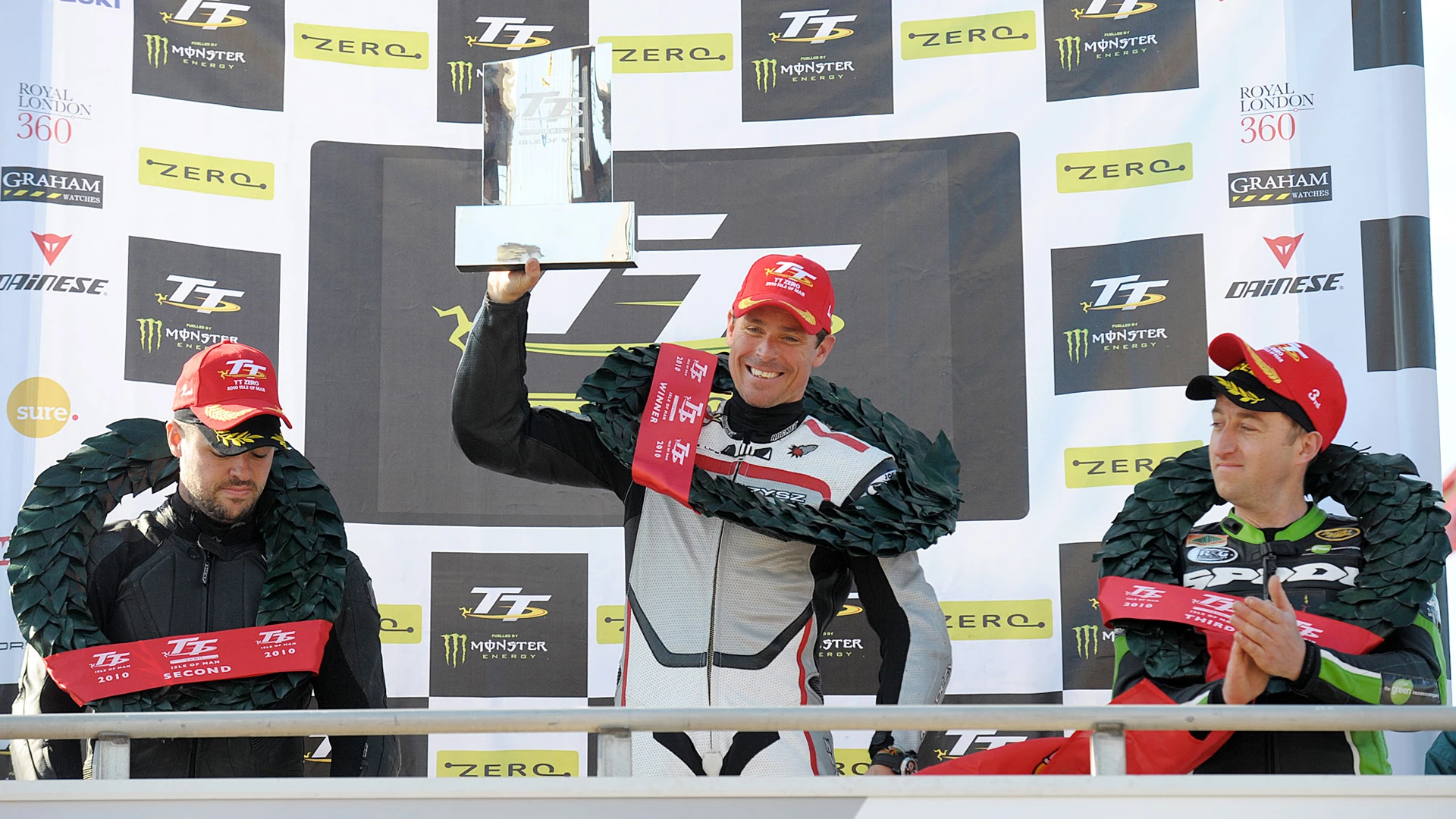 Mark Miller lifts the prize