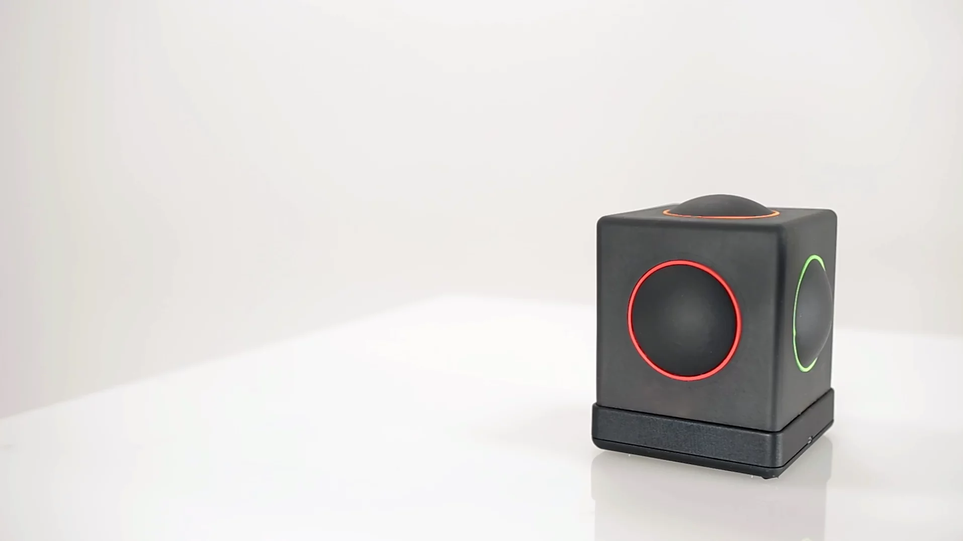 The Skoog 2.0 is a soft, squeezable, wipe-clean foam cube with spots on five of its faces