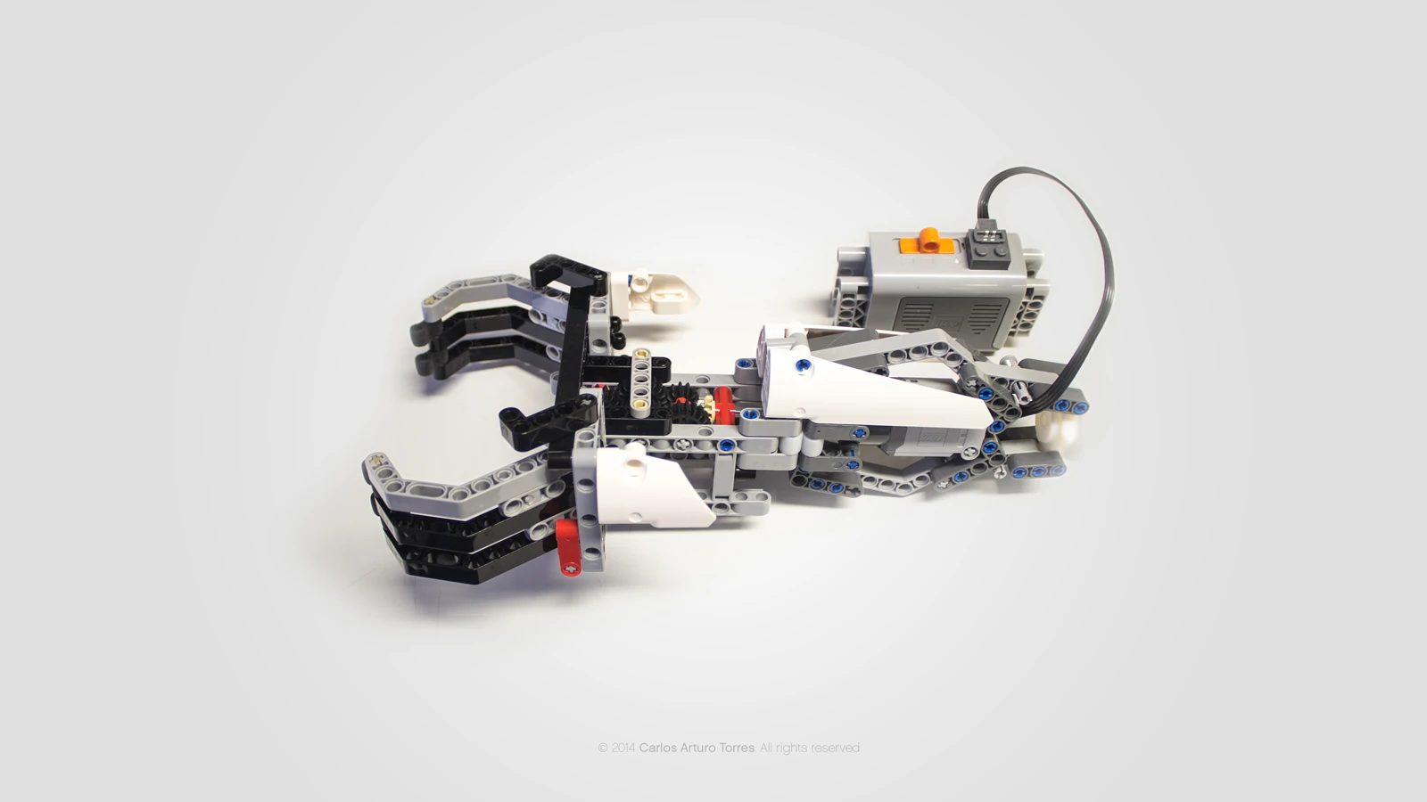 On the slightly more practical but still awesome side, one of the Lego sets Torres brought along, was a construction backhoe, which required a power function that was compatible with the muscle module