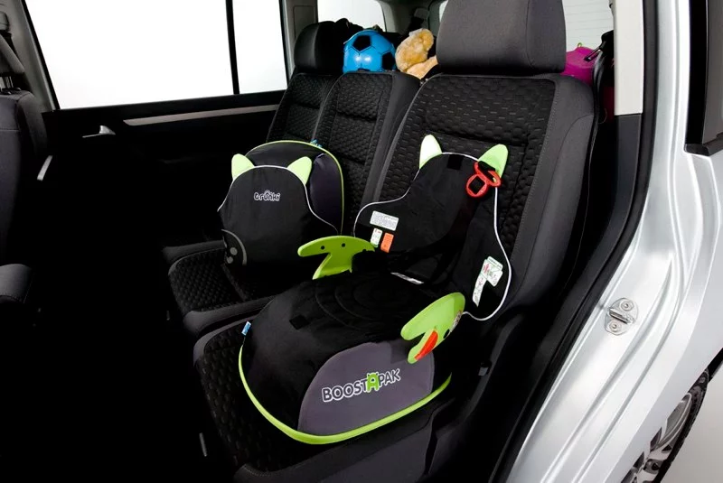 The BoostApak coverts from child's backpack to booster seat