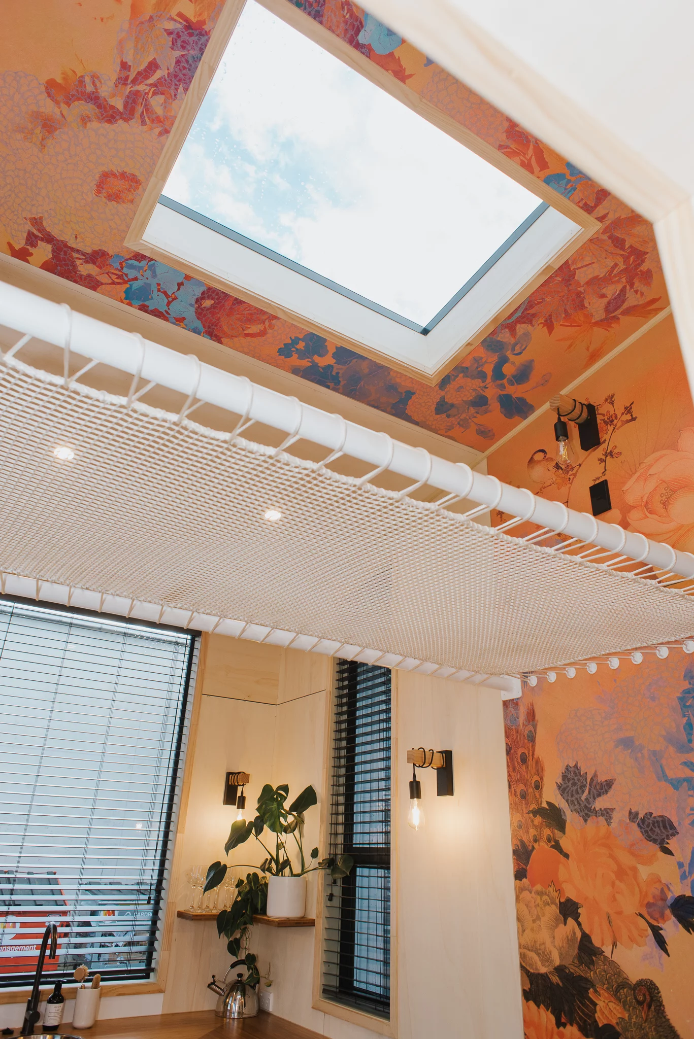 The Autumn's interior is finished in plywood, with wallpaper provided by the owner adding a splash of color