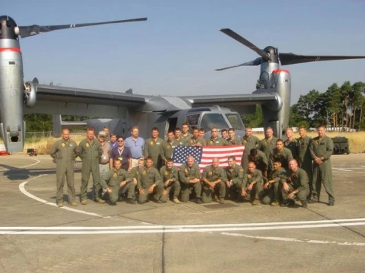 A group shot of the VMX-22 team after their completion of the first MV-22 trans-Atlantic flight. More than 40 Marines participated in the exercise, including pilots, aircrew and ground support personnel.