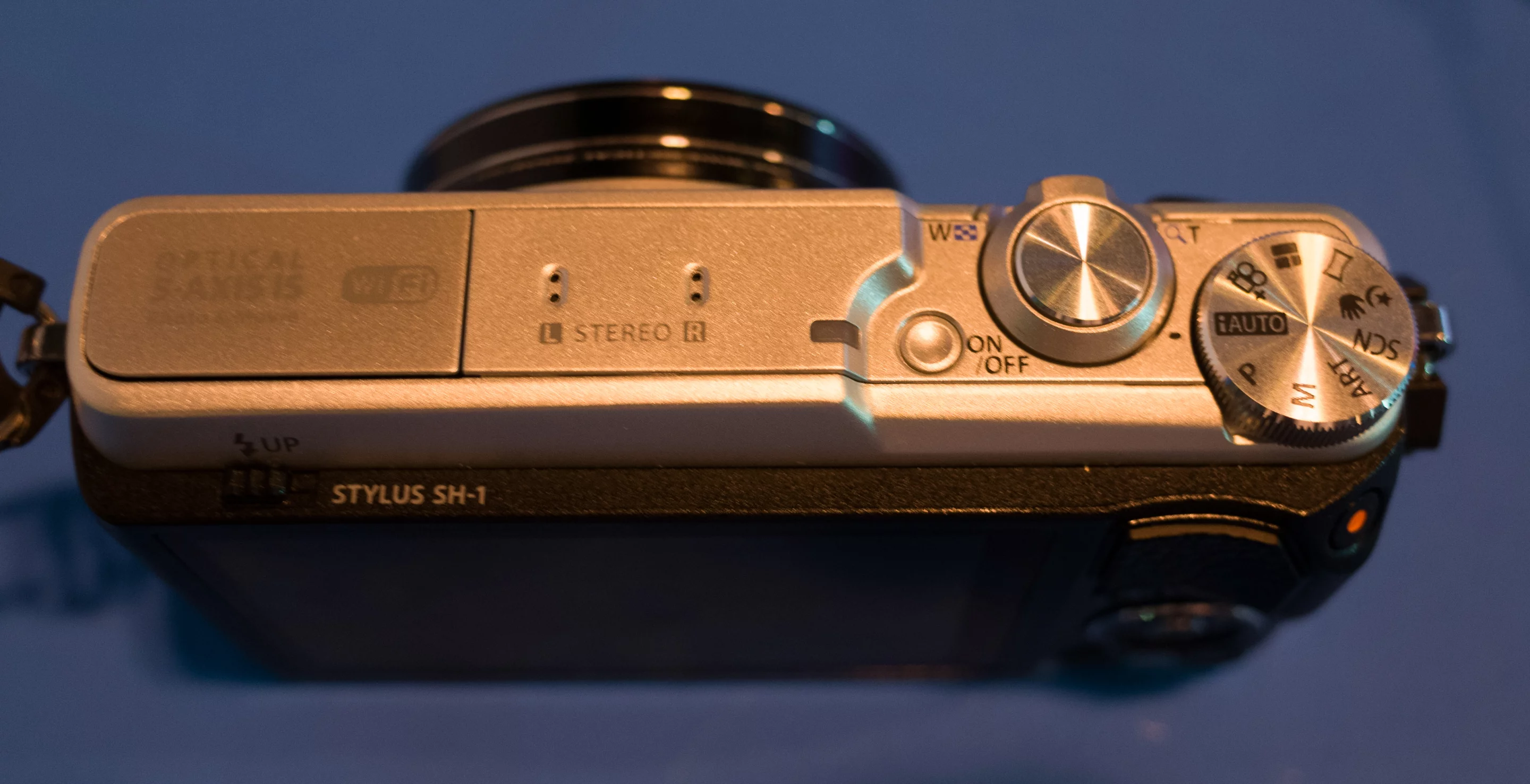 The Olympus Stylus SH-1 has a 16-megapixel 1/2.3-inch-type CMOS sensor