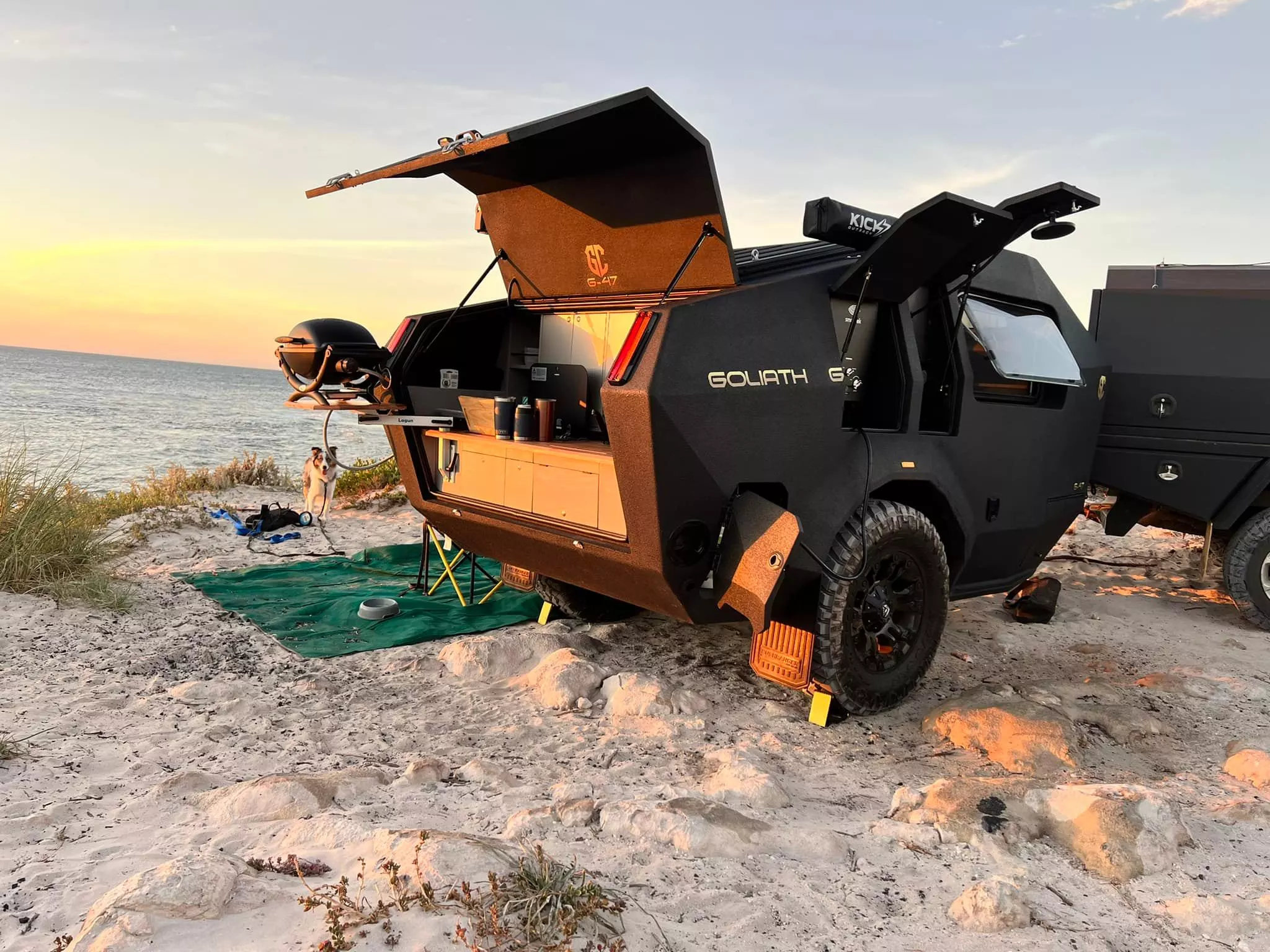 The swing-away worktop can be used as prep space or to hold the portable Weber grill