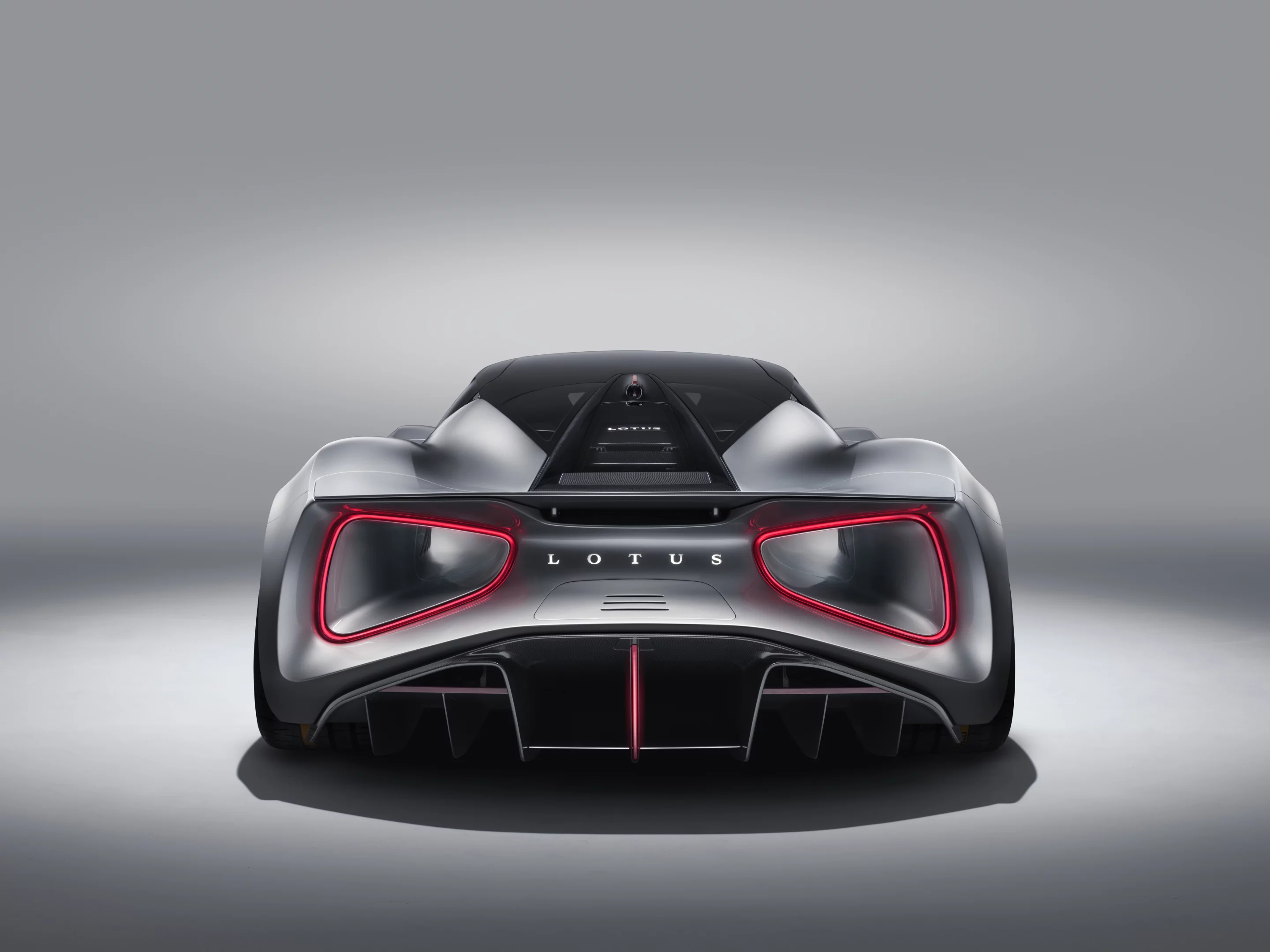 On the Lotus Evija giant venturi tunnels exit at the rear, rimmed by the taillights