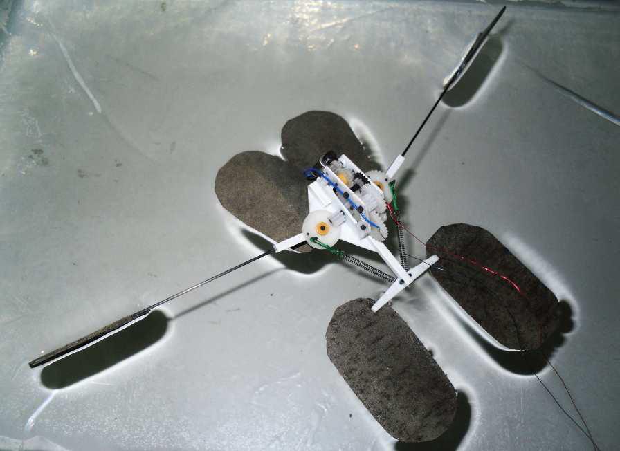 A newly developed microrobot is the first that can move around by continuosly jump on the water's surface without sinking, mimicking the water strider (Image: American Chemical Society)