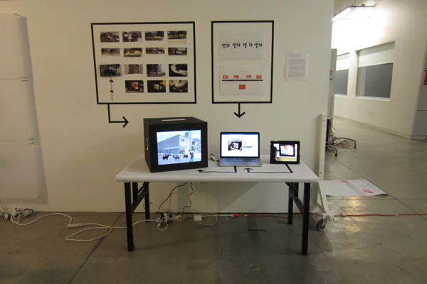 With Portal boxes, two people connected to the internet can literally reach behind a screen to interact with the virtual world inside together