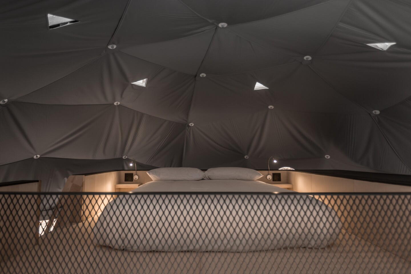 The elevated second sleeping quarters with full queen size bed
