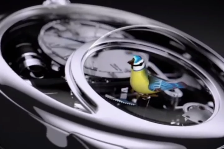 The Charming Bird contains a tiny mechanical bird behind the crystal