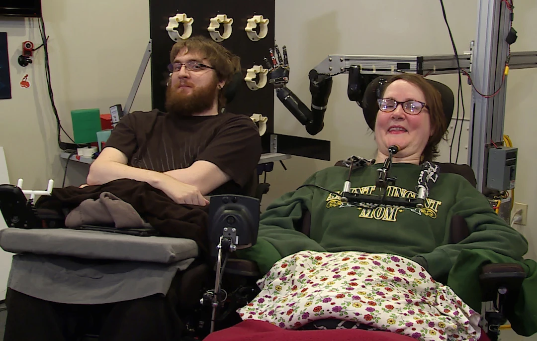 Nathan Copeland, (left), and Jan Scheuermann, have had robotic hands wired directly into their brains, granting them some motor function and, in Copeland's case, the sense of touch