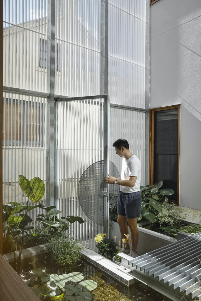 Helvetia's atrium includes ponds with fish and lilies, helping cool the immediate area