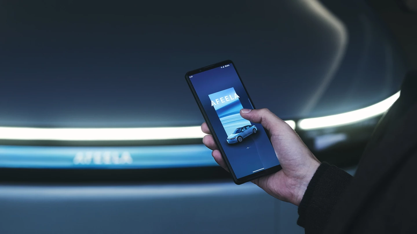 The car door automatically opens as you get closer by communicating with the companion app on your phone