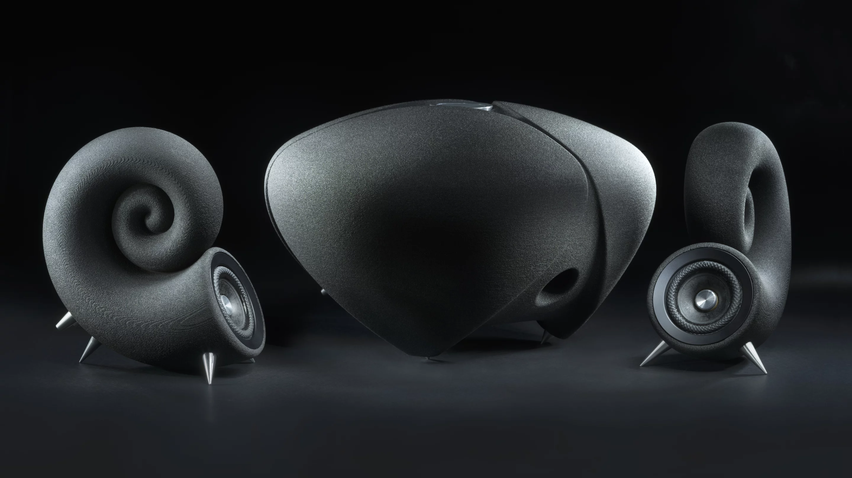 The Ionic Sound System is made up of an active subwoofer and two passive speakers, all encased in enclosures 3D-printed from sand