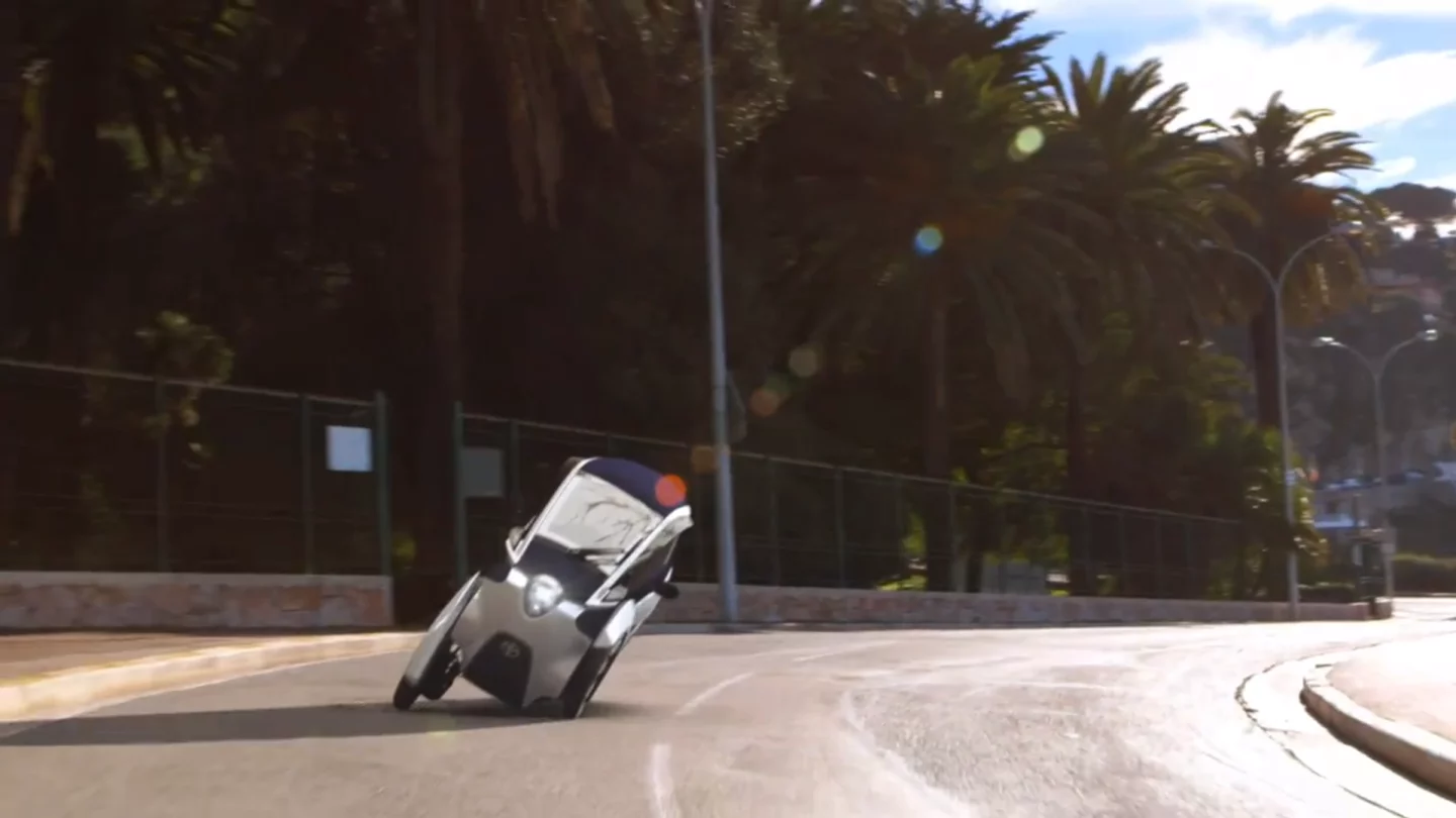 Toyota's i-ROAD is a fully-enclosed, two-seater, three-wheeled, fully-electric, Personal Mobility Vehicle (PMV)