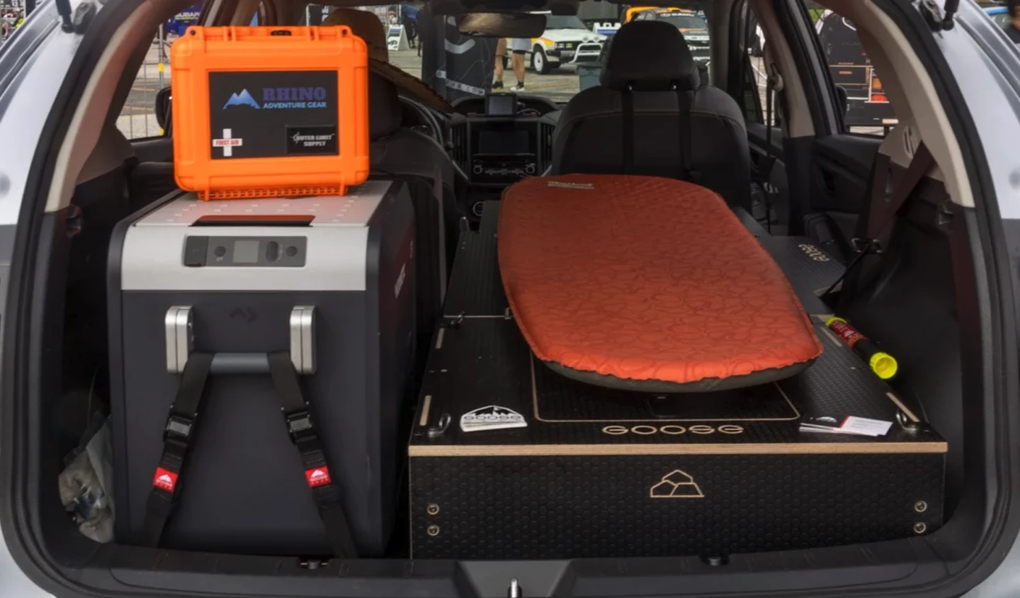 The Goose Gear Ultimate Chef/Sleeper package brings a solo sleeper platform with below-deck storage and a fridge slide