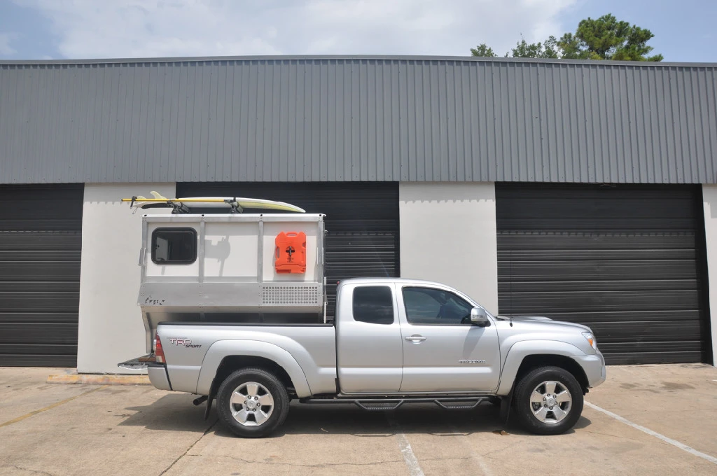 The exterior is designed to hold gear, such as tools and water systems