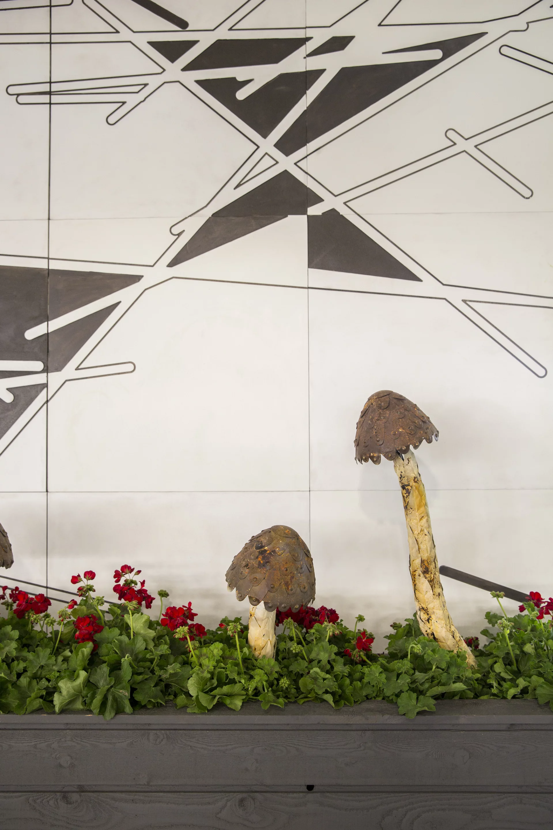 The exterior of SCADpad North America has a minimalist paint treatment on metal panels, which was designed by SCAD painting graduate Julio Garcia (Photo: SCADpad)