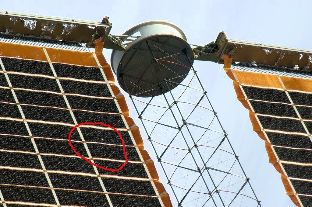 A passing bit of space debris recently punched a hole in one of the ISS's solar panels