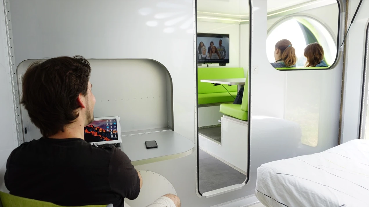 The master bedroom includes a drop-down desktop, adding some appeal for digital nomads