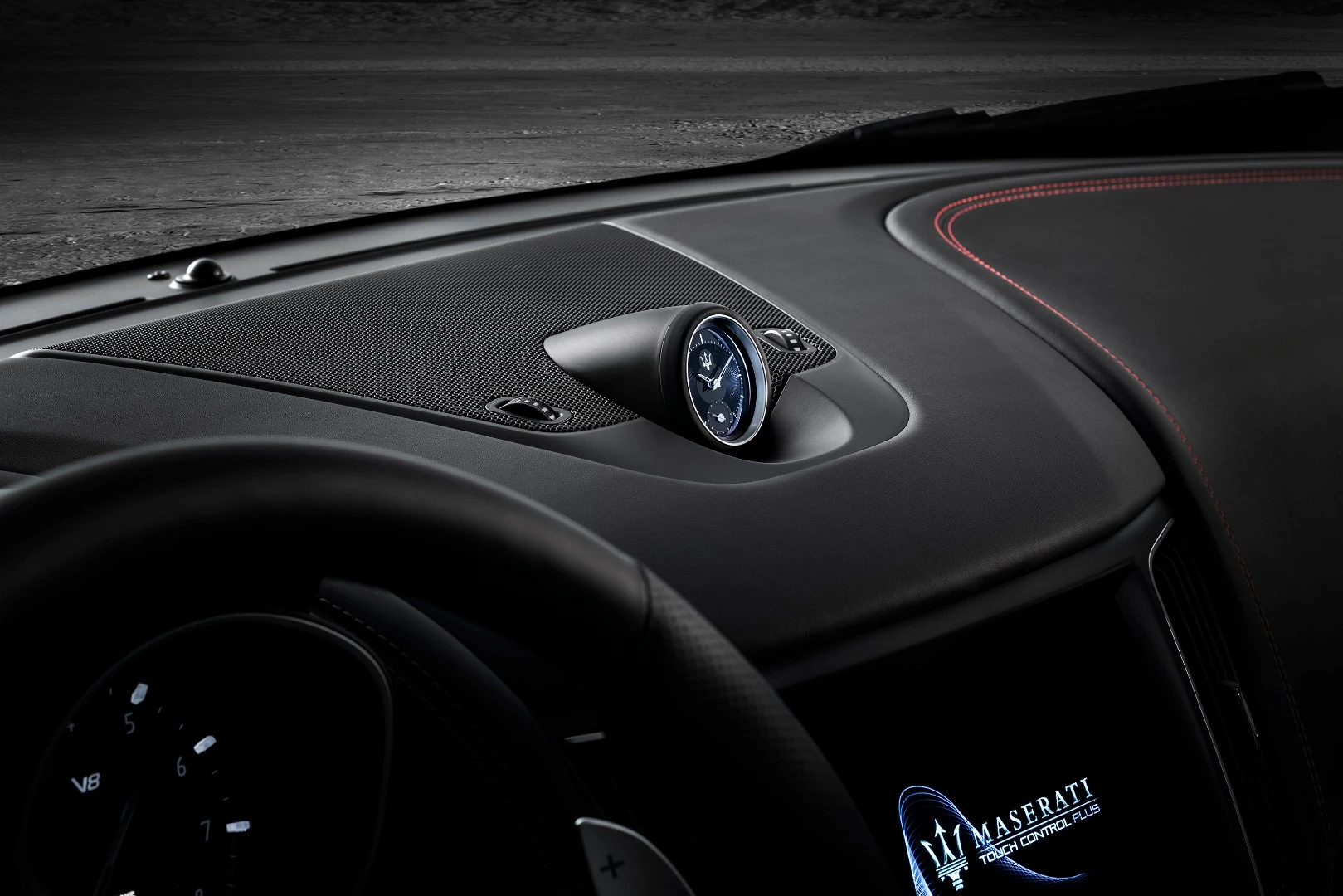 The Levante Trofeo features a uniquely styled Maserati clock