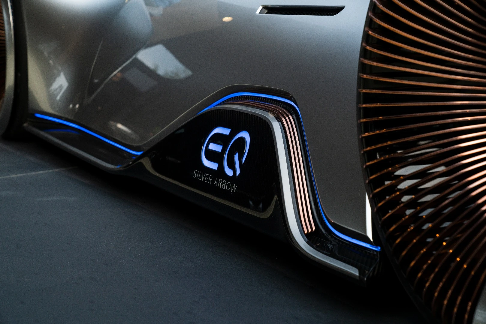 Lighting strips built into the front and side skirts add a dash of color to the EQ Silver Arrow concept