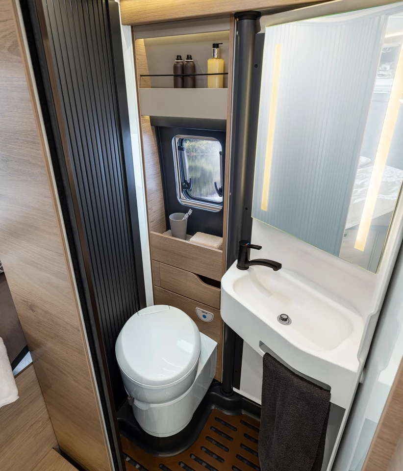 Wall swiveled back into toilet room form