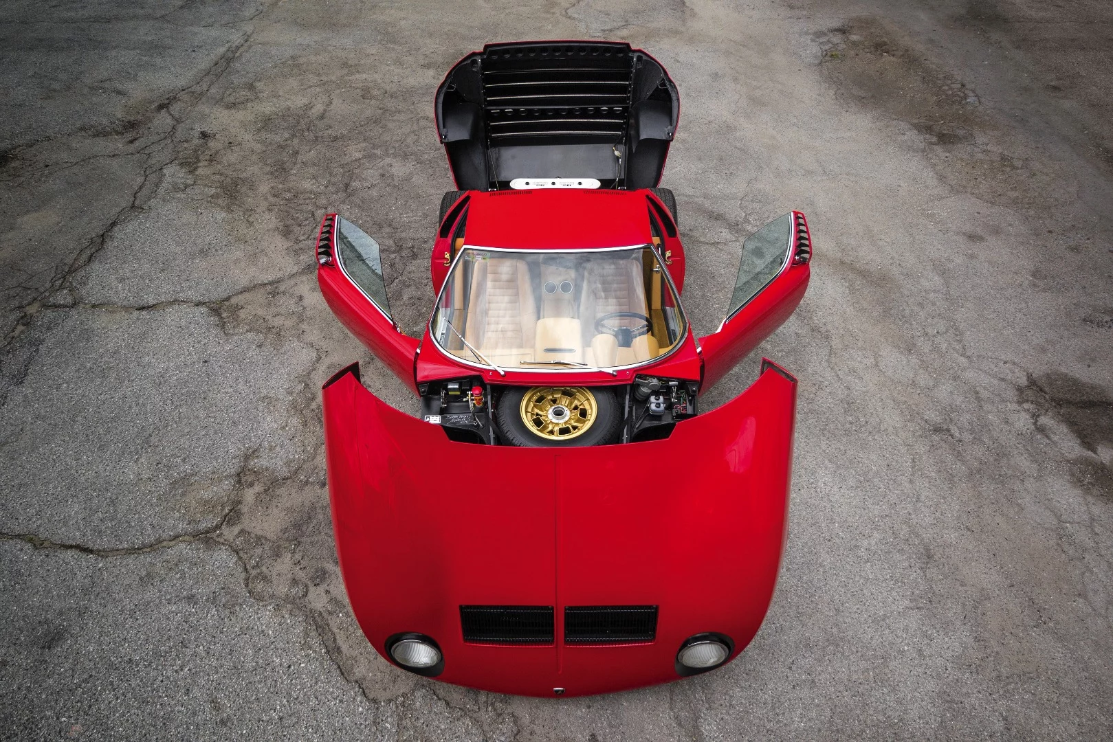 Lot 105 is a 1971 Lamborghini Miura P400 SVn which fetched $2,475,000 to set a new record for the model