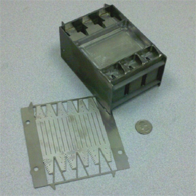Microchannels narrower than a paper clip are etched onto the heat exchanger’s shim, which has been removed in this photo for illustrative purposes
