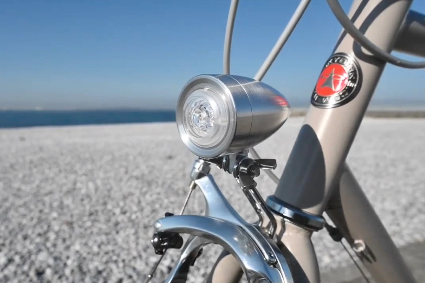 The KiLEY Bullet Light mounts behind the front rim brake – assuming the bike has one