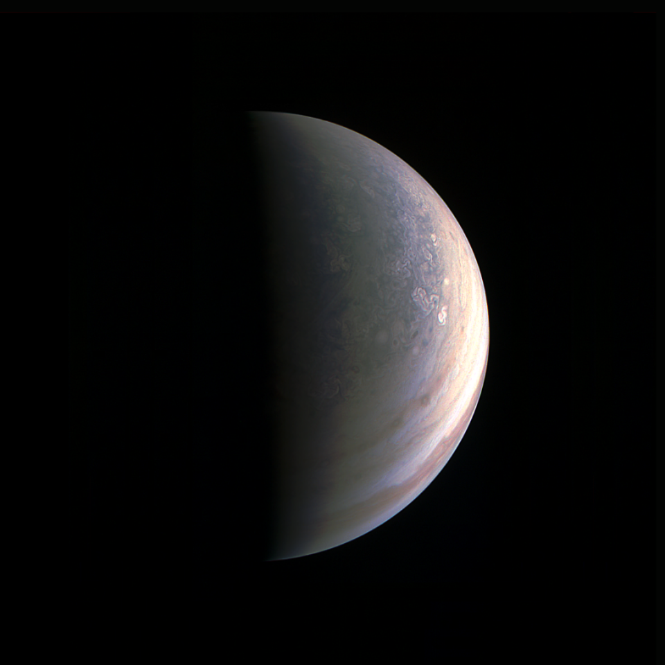 NASA's Juno spacecraft captured this view as it closed in on Jupiter's north pole, about two hours before closest approach on Aug. 27, 2016