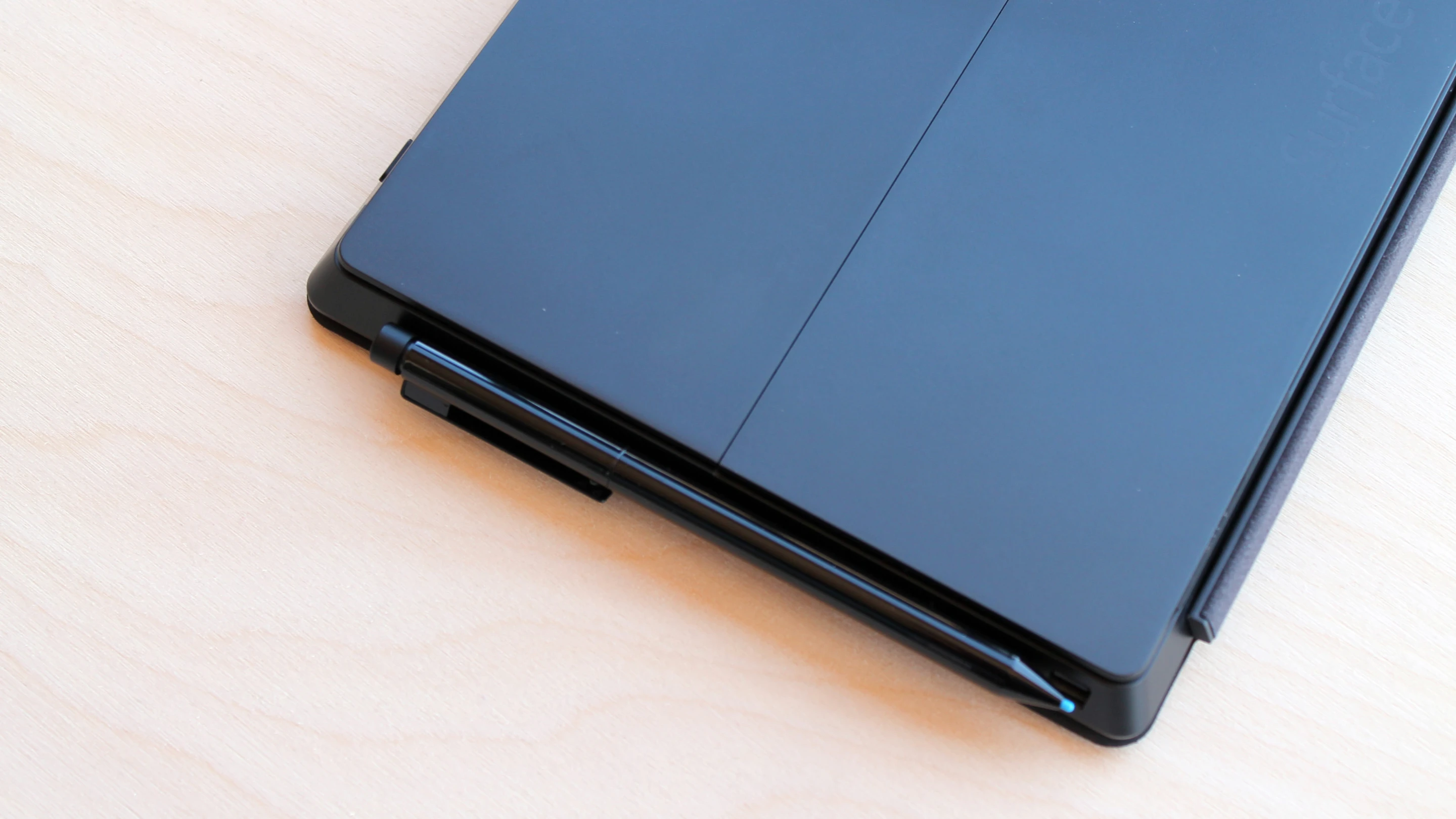 When you're finished, fold over the keyboard cover and snap the stylus into the charging port