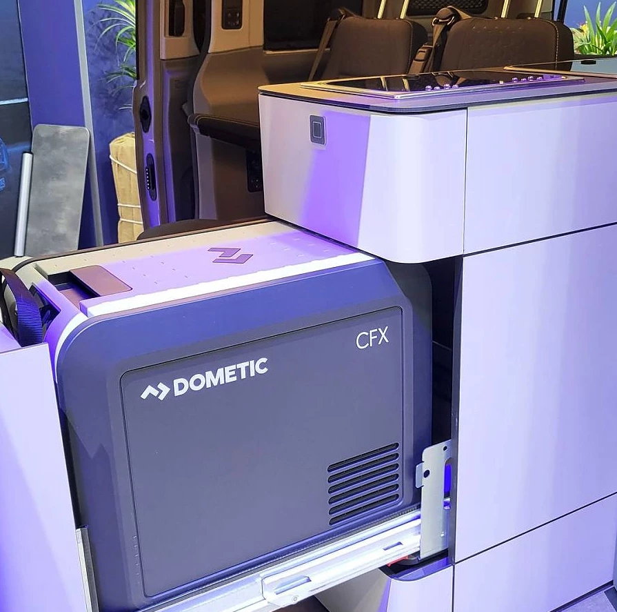 The Dometic CFX compressor fridge slides out from the end of the kitchen block for indoor/outdoor access