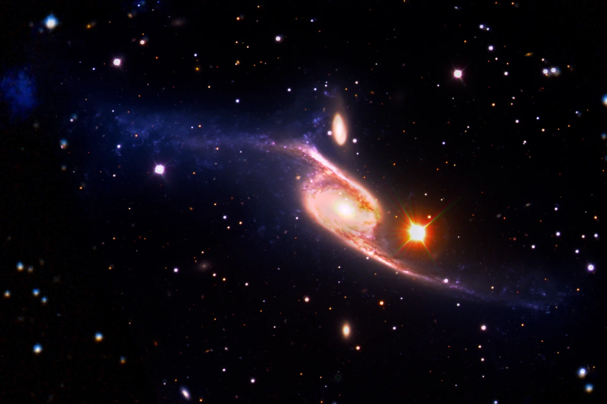 Spiral galaxy NGC 6872 is some five times the size of the Milky Way