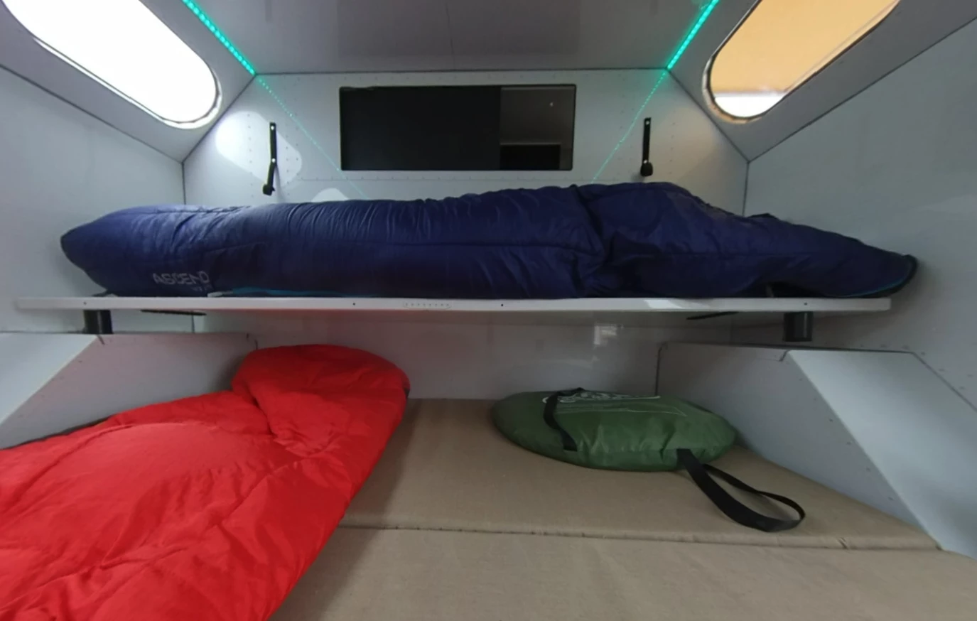 As if a near-king-size bed isn't enough space for a small, teardrop-like trailer, Mammoth adds a fold-down bunk for extra sleeping space