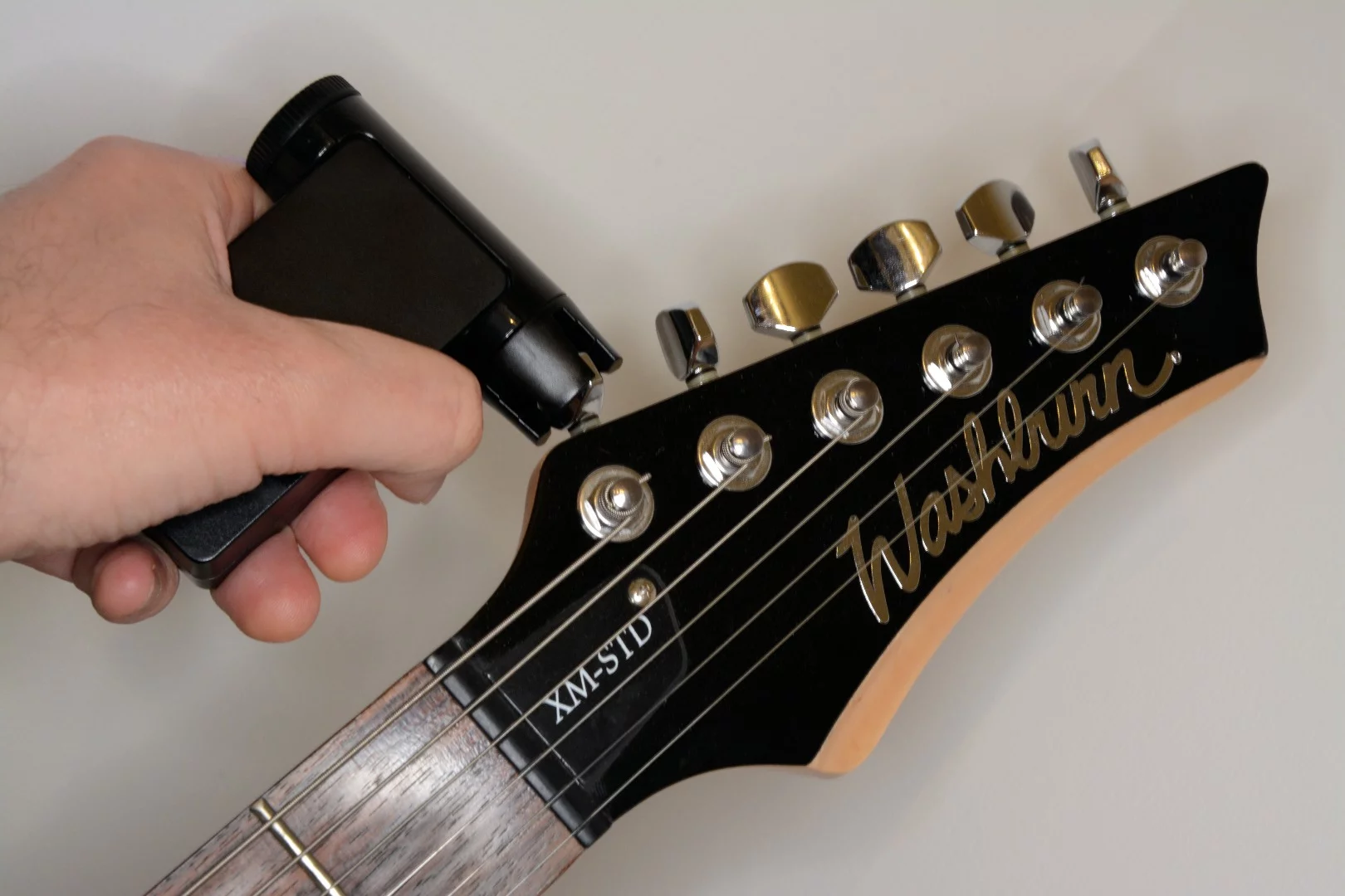 The Roadie 2 motorized tuner can bring a guitar to perfect pitch without needing help from a smartphone running an app