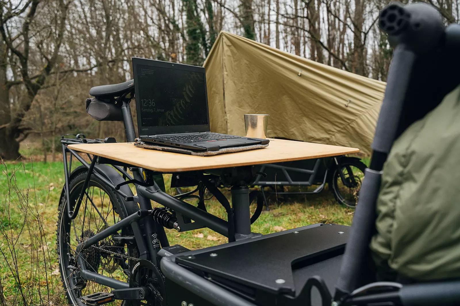 One Spacecamper Bike ready for remote work, the other all closed up for weather protection