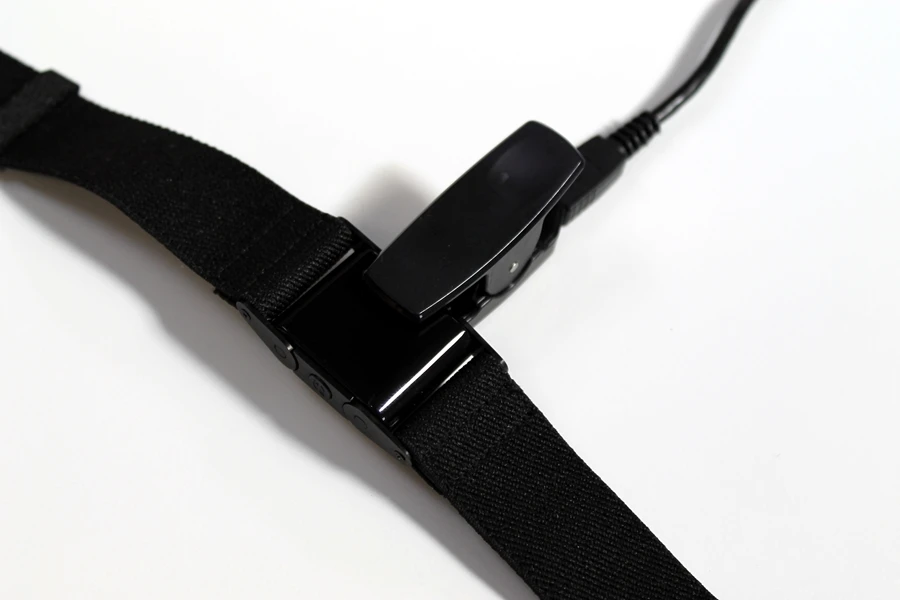 A USB connected crocodile clip is use to charge the PulseOn
