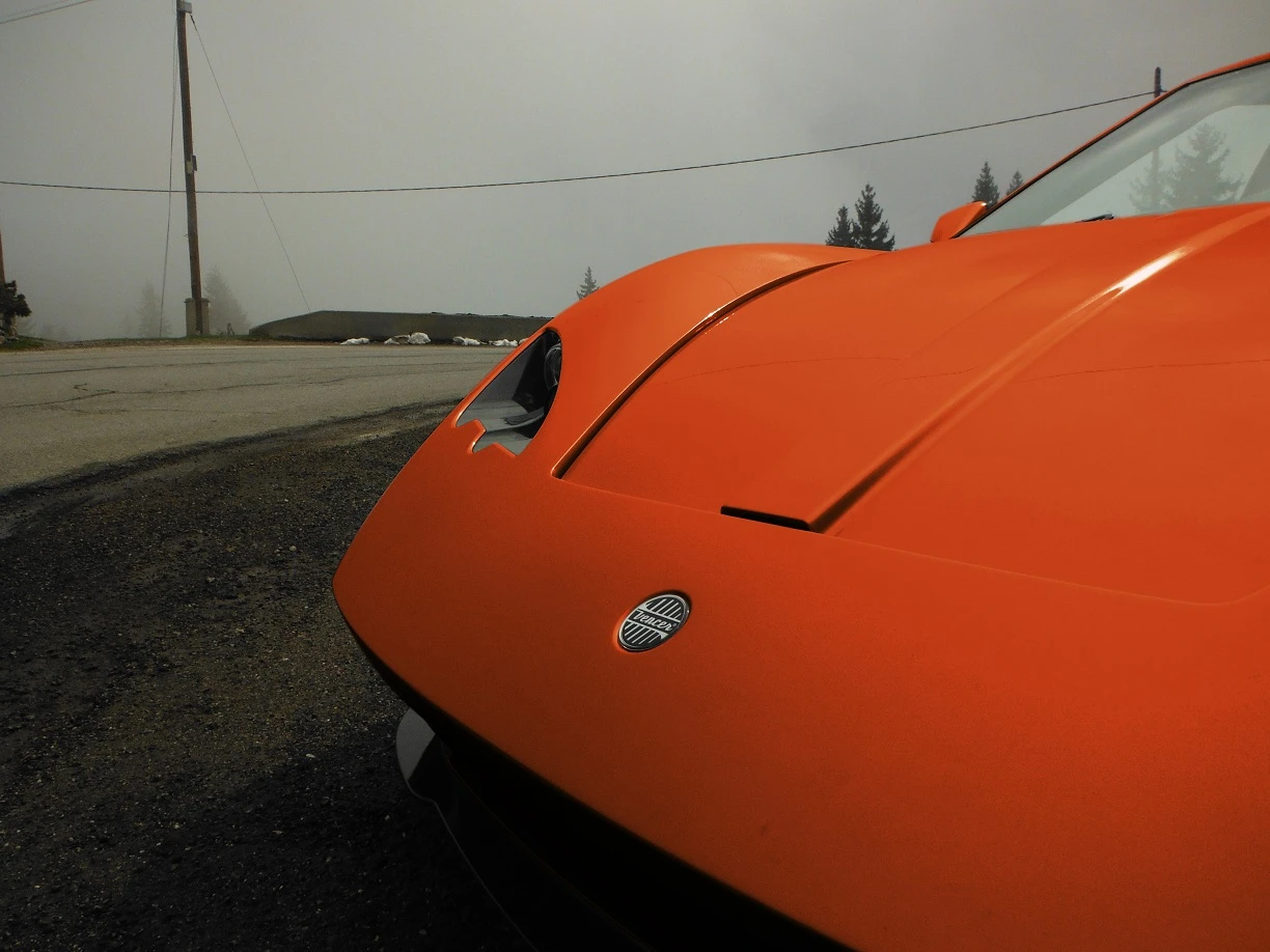 CNC moulded body panels of lightweight carbon cover the Sarthe from head to tail