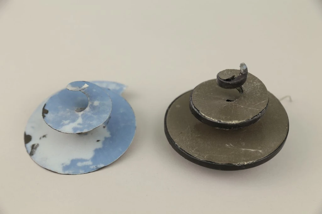 The 3D-printed diaphragm is shown on the left and an assembled speaker is shown on the right (Photo: Disney Research)